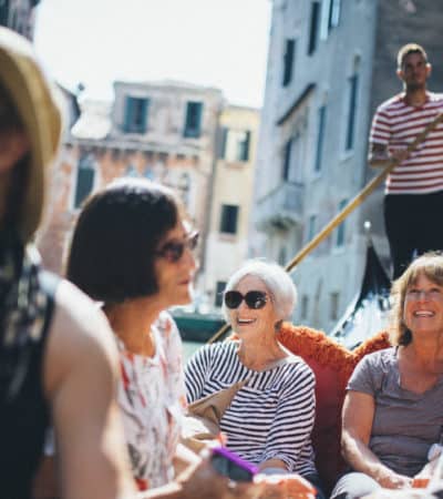guests aboard a gondola in Venice on an EF Go Ahead Tours tour in Italy