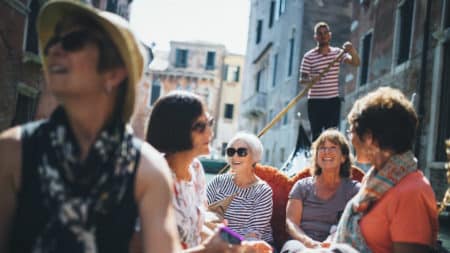 guests aboard a gondola in Venice on an EF Go Ahead Tours tour in Italy