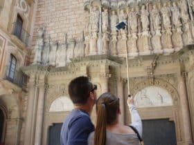 People taking a picture of themselves at Montserrat in Spain