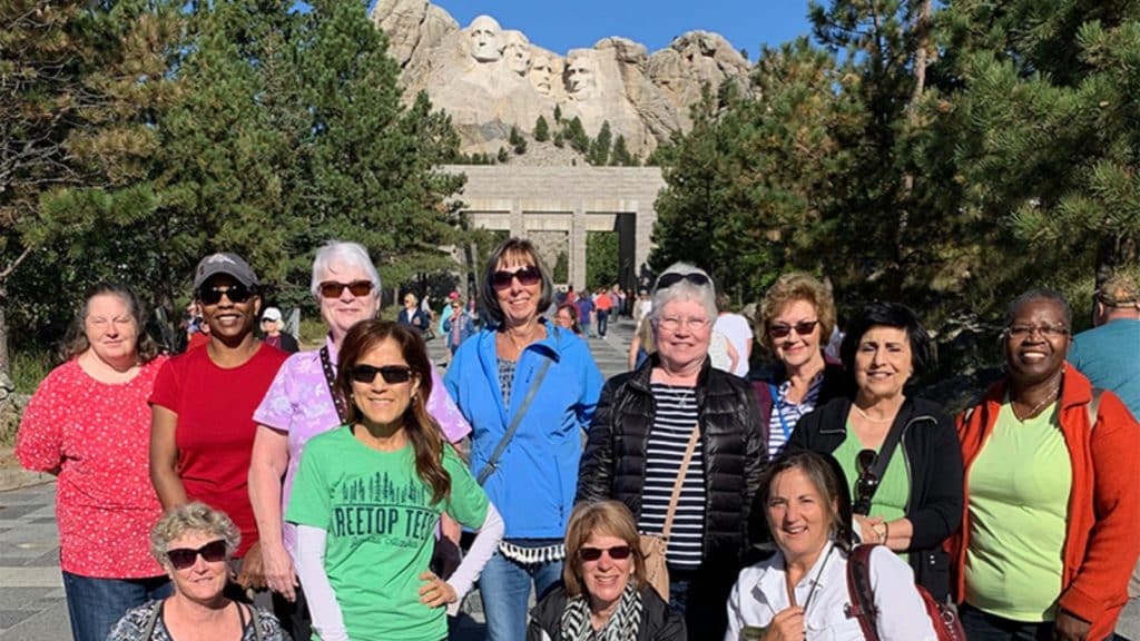 Women Traveling Together tour group at Mt. Rushmore (Photo: Women Traveling Together)