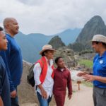 Adventure guide Rudy telling guests a story about Machu Picchu on Adventure by Disney's Peru tour
