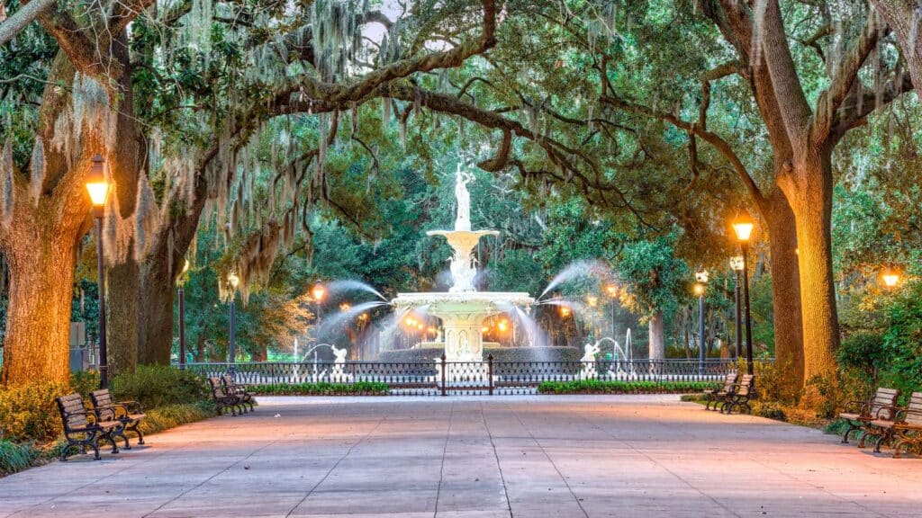 trees framing the fountain at Forsyth Park in Savannah, Georgia