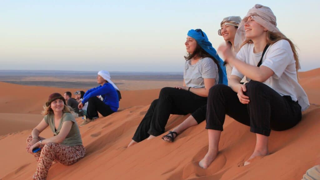 Young adults on Intrepid Travel's Morocco Sahara Sunset tour (Photo: Intrepid)