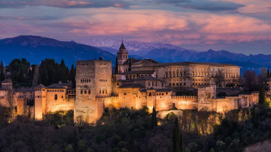 Alhambra Arabic Palace in Granada,Spain Illuminated at Twilight. Sunset Over Alhambra.