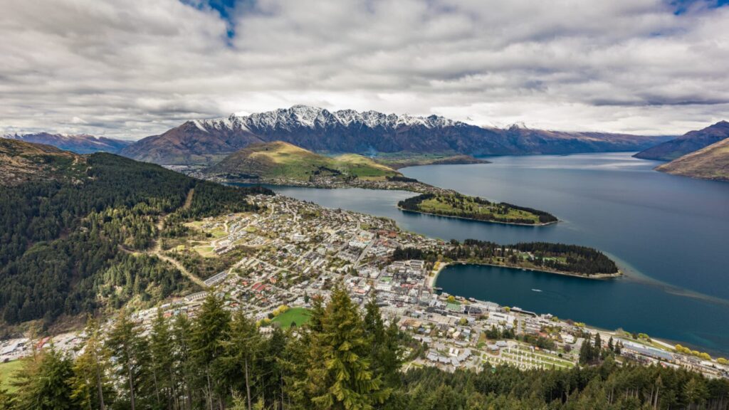 Panoramic view of New Zeland's The remarkables, Lake Wakatipu and Queenstown on the South Island