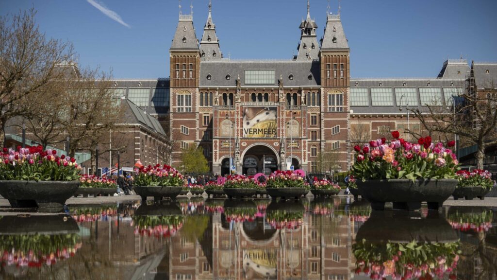 view of museum and flowers on National Geographic Expeditions tour of Holland and Belgium by river ship in spring