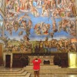 Tauck Tours traveler taking a picture in the Sistine Chapel