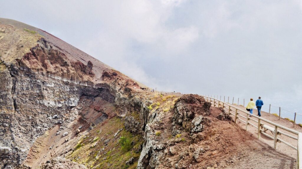 Hikers on the trail going up Mount Vesuvius in Italy
