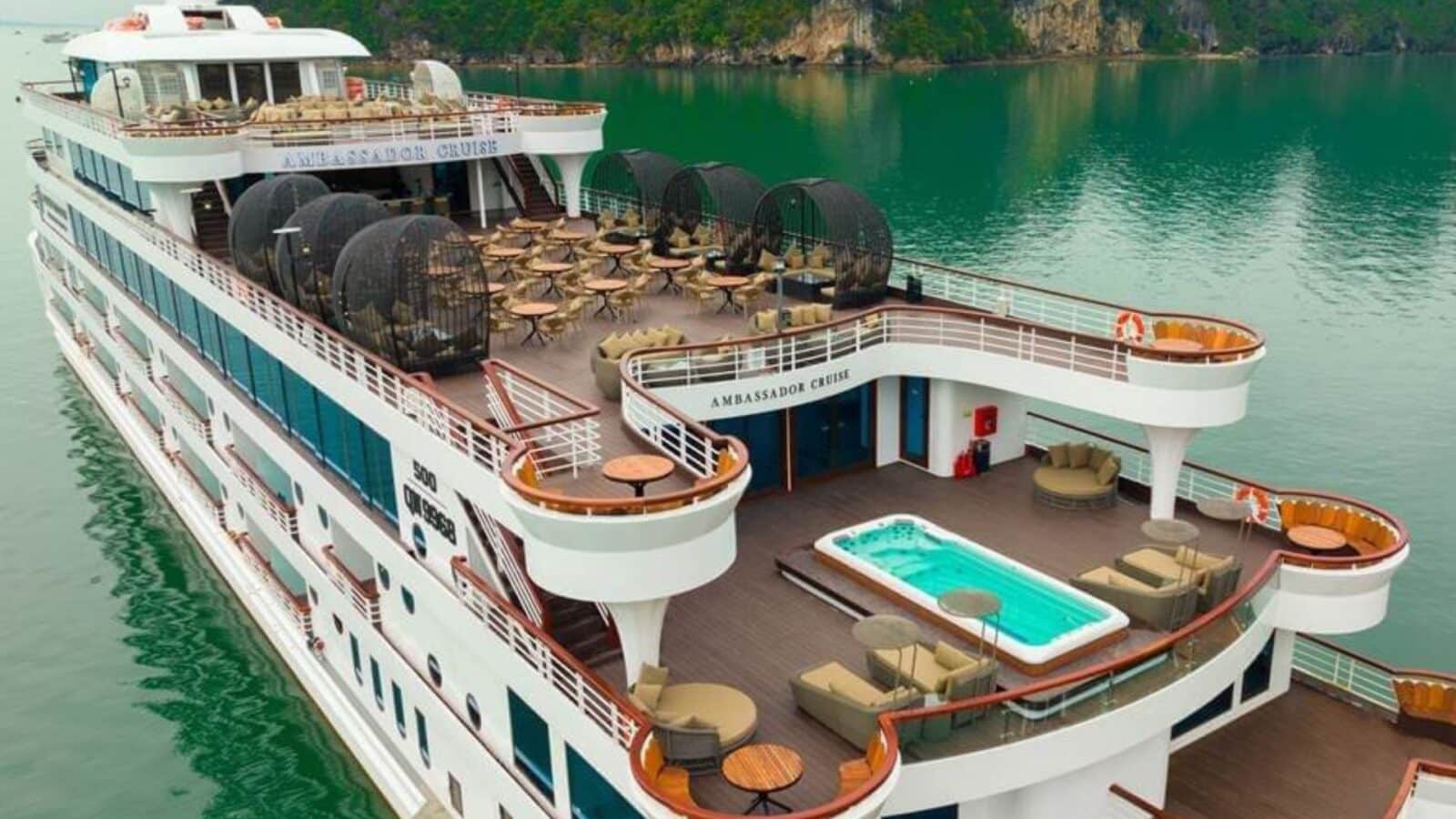 view of Ambassador Cruise ship on Halong Bay in Vietnam, with upper decks visible