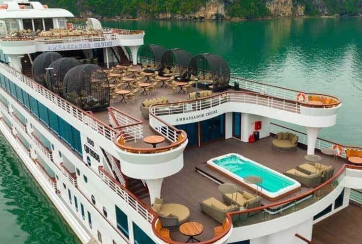 view of Ambassador Cruise ship on Halong Bay in Vietnam, with upper decks visible