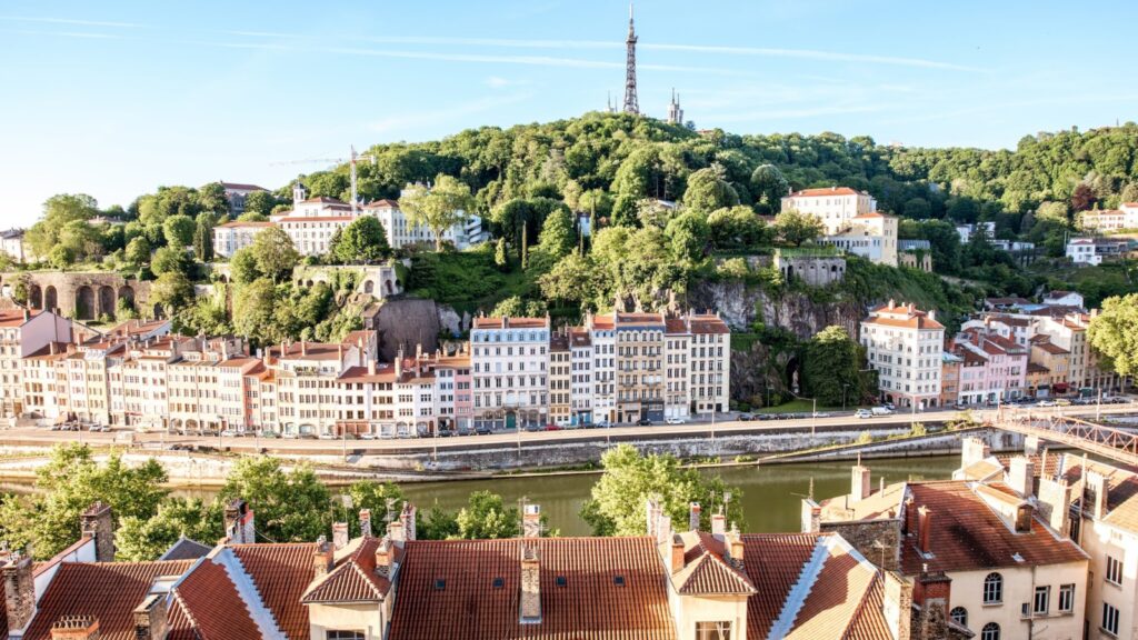 Lyon buildings, river, and hill in the morning