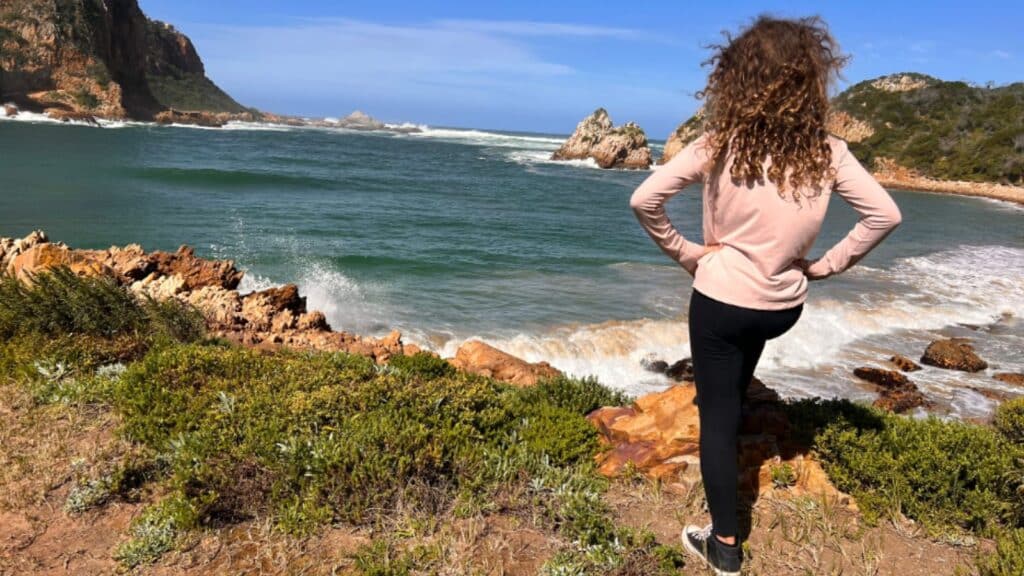 Girl enjoying the scenery at Featherbed Nature Reserve on Adventures by Disney's South Africa tour