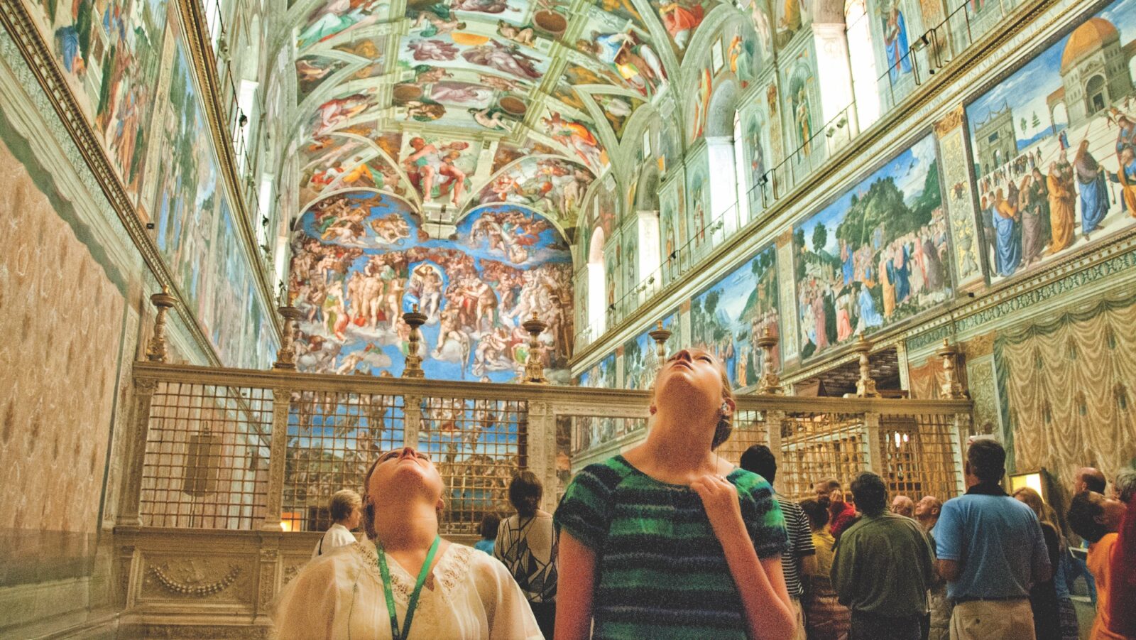 young people looking up at the SIstine Chapel on a tour with Tauck