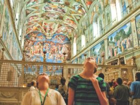 young people looking up at the SIstine Chapel on a tour with Tauck