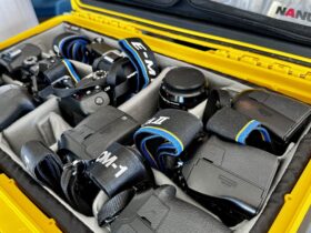 close up of camera bodies in Lindblad Expedition's Gear Locker onboard a ship