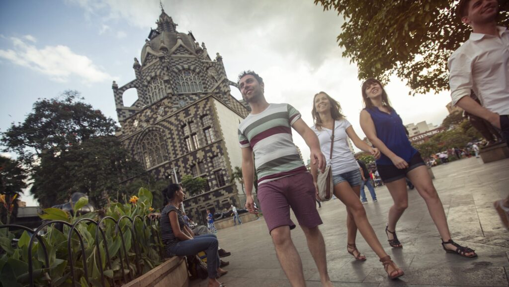 G Adventures tour group in Plaza Botero in Medellin, Colombia