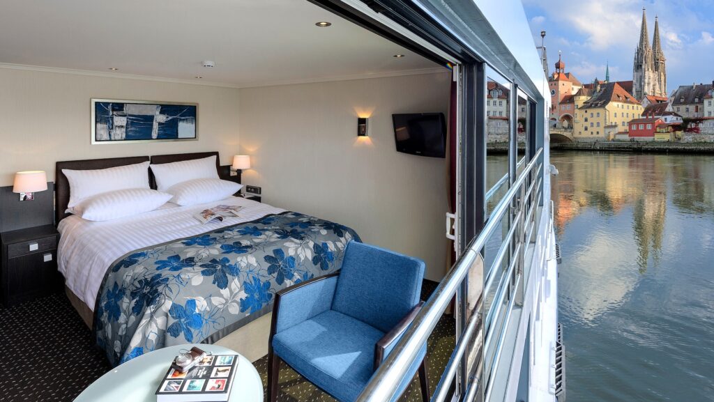 Avalon Waterways panoramic suite with French city in background