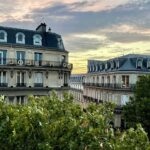 view out over buildings in Paris at dusk