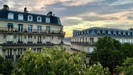 view out over buildings in Paris at dusk