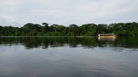 boat on river in tortuguero national park in costa rica on a trafalgar tour