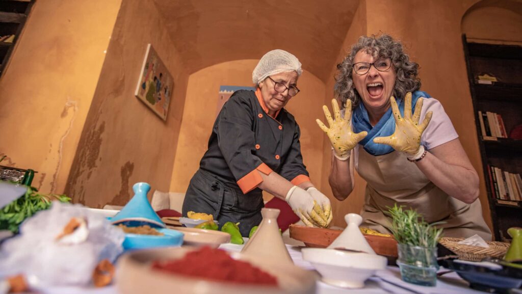 Travelers taking a food class in Morocco with G Adventures