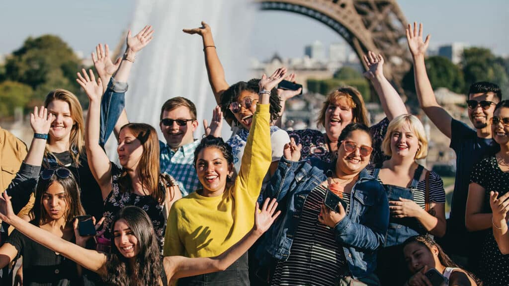 Group of students in front of Eiffel Tower in Paris