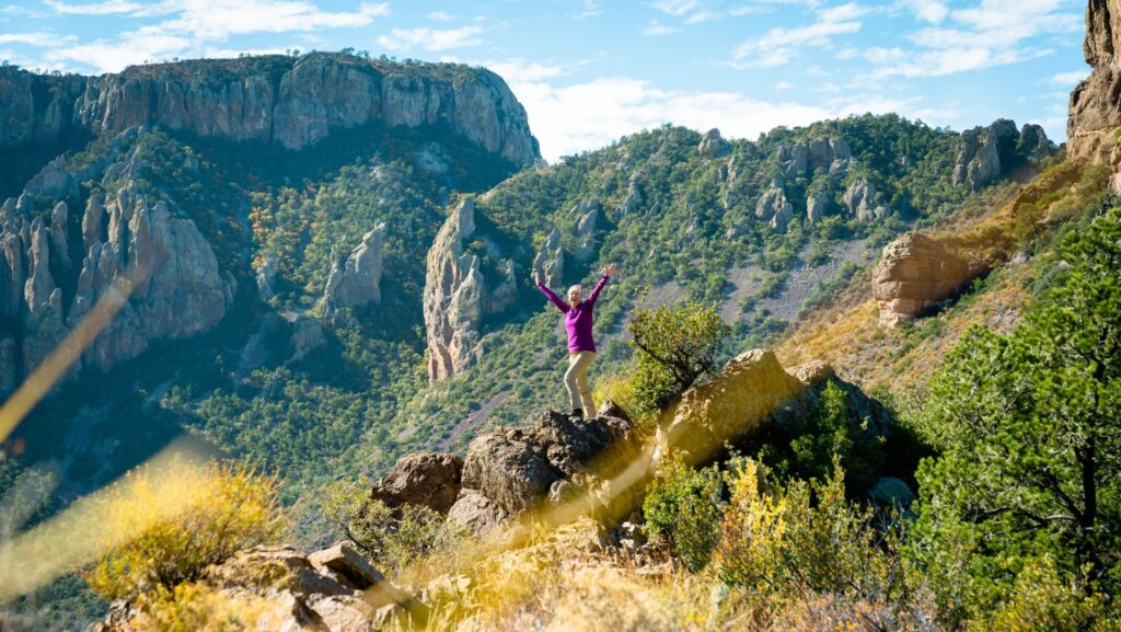 A woman hiking in Big Bend in Texas on a Road Scholar tour