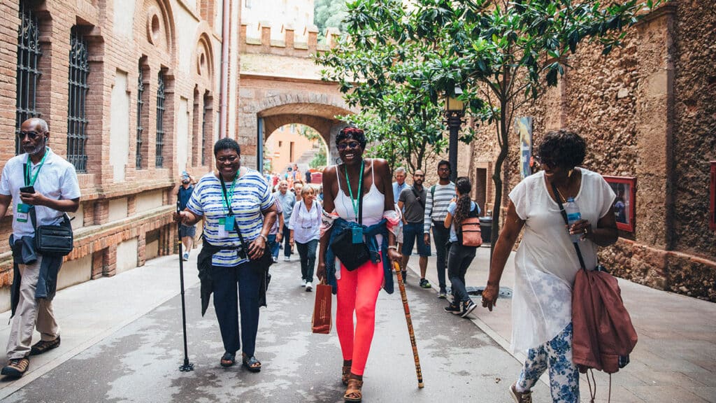 Women walking together down old city street