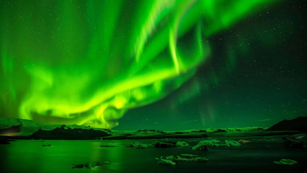 The green hues of the Northern Lights on a Collette tour to Iceland