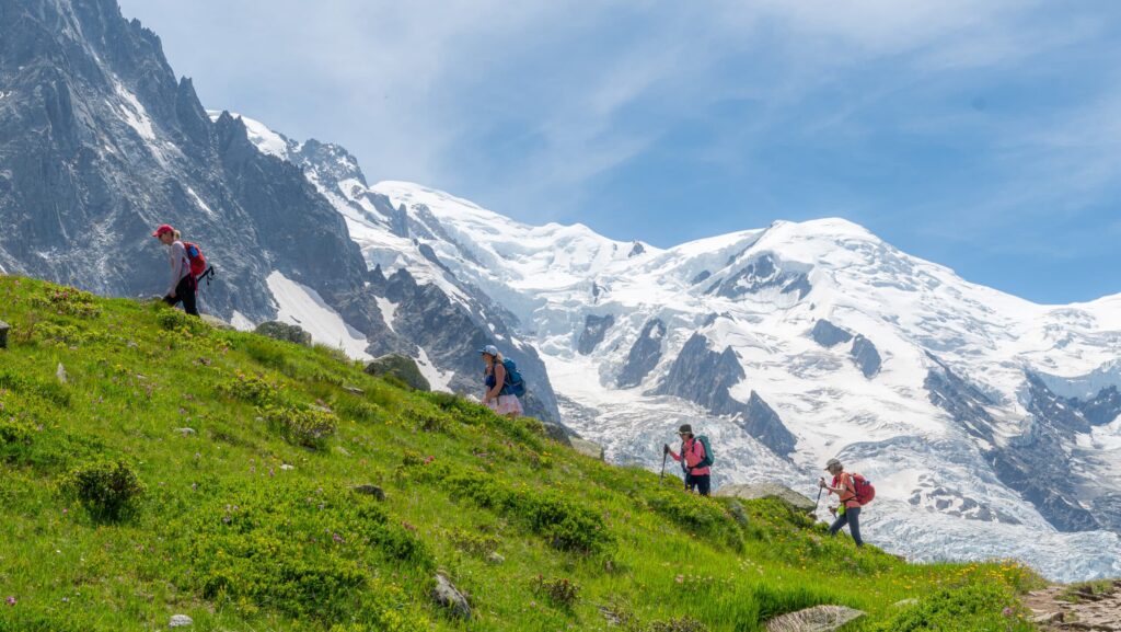 A group of women hiking in the Alps on a Backroads tour