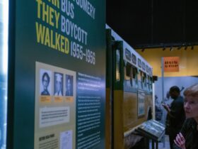 A woman looking at an exhibit display at the National Civil Rights Museum in Memphis