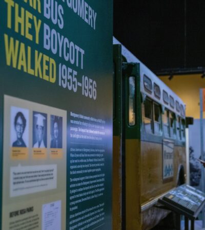A woman looking at an exhibit display at the National Civil Rights Museum in Memphis