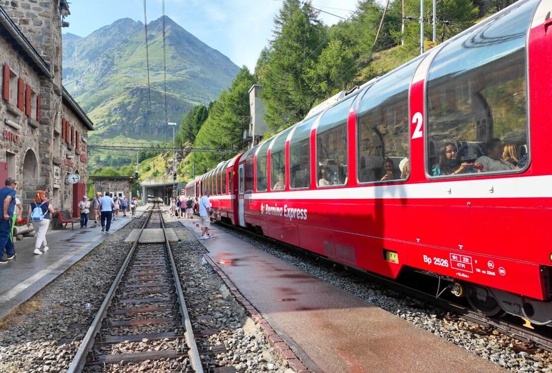 The Bernina Express at a station in Switzerland
