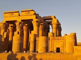 People visiting Egyptian ruins