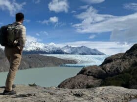 A backpacker looking at a view in Patagonia